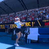 Yulia Putintseva dances after her win today.