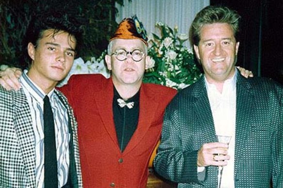 Alexandre Despallieres, left, with Elton John and Peter Ikin.