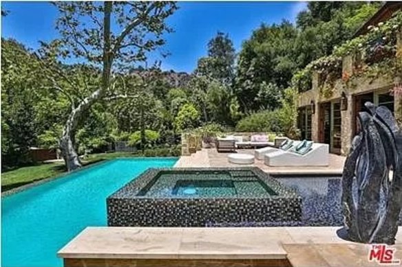 The sunny deck and pool zone of the Bel Air mansion. 