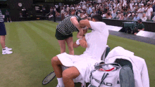 Novak Djokovic pranks a ballgirl. 