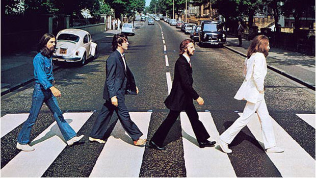 The iconic cover shot of the Abbey Road album, taken outside the titular London studio as the Beatles recorded there in 1969.