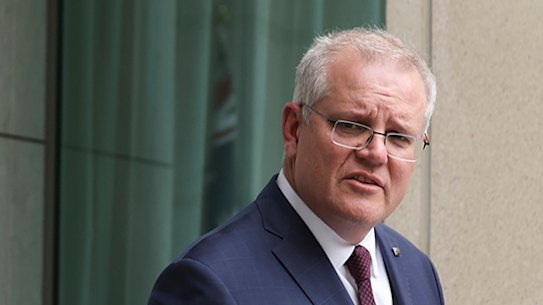 Chief Medical Officer Professor Paul Kelly and Prime Minister Scott Morrison during a press conference at Parliament House in Canberra on Monday 21 December 2020. fedpol Photo: Alex Ellinghausen Squiz