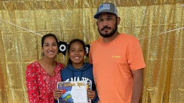 The last photograph of Alexandria Rubio before her death, pictured with her parents after she made the honour roll and received the good citizen award at Robb Elementary School. 