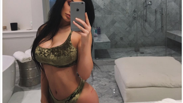 Kylie Jenner squeezed in one last bathroom selfie. 