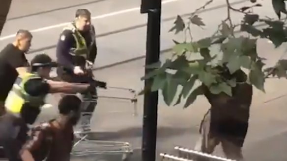 Michael Rogers, 46, drew widespread praise and the nickname 'Trolley Man" for pushing the trolley repeatedly at Hassan Khalif Shire Ali as the 30-year-old man attempted to stab police.