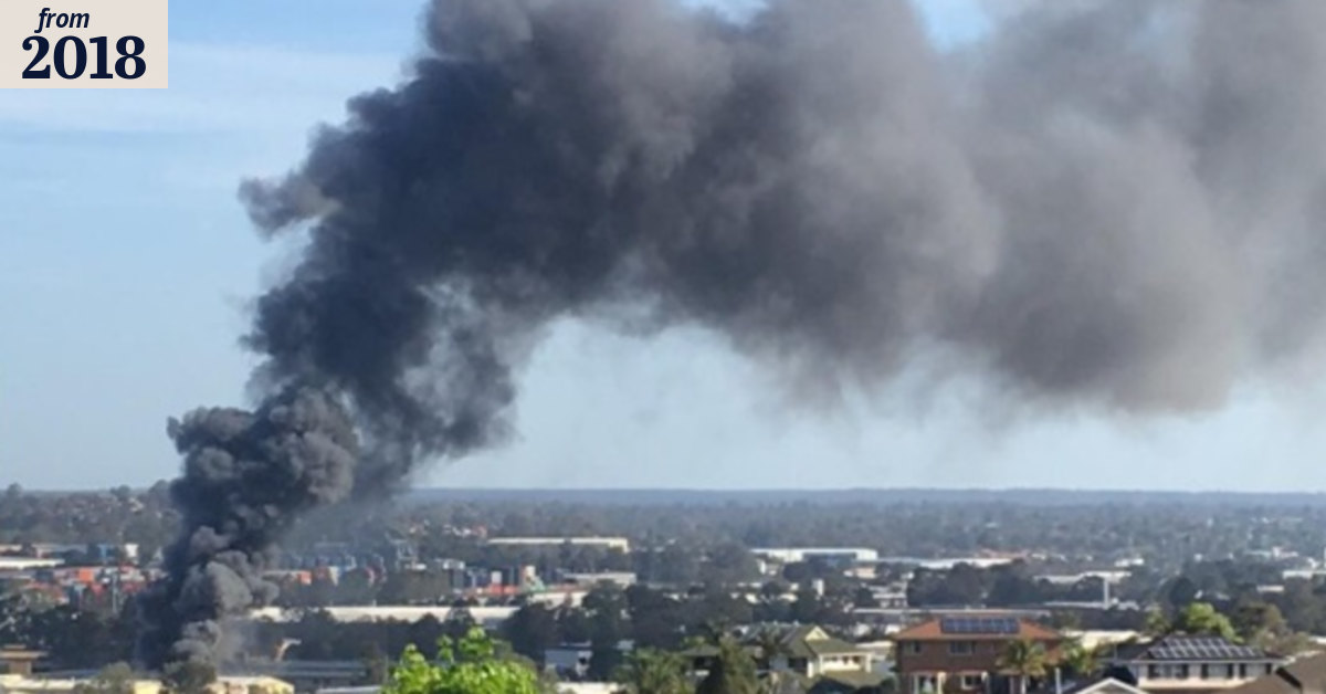 Smoke billowing from factory in western Sydney as dozens fight fire