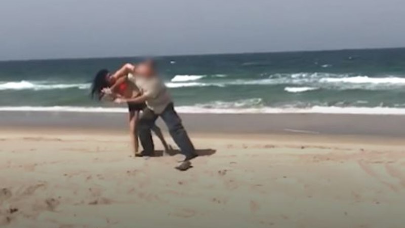 Bikini Clad Woman Attacks Ranger After Friend Climbs Wwii Relic