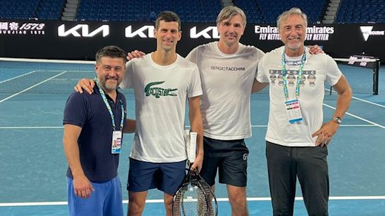Novak Djokovic at Rod Laver Arena on Monday night after his court win with his team.