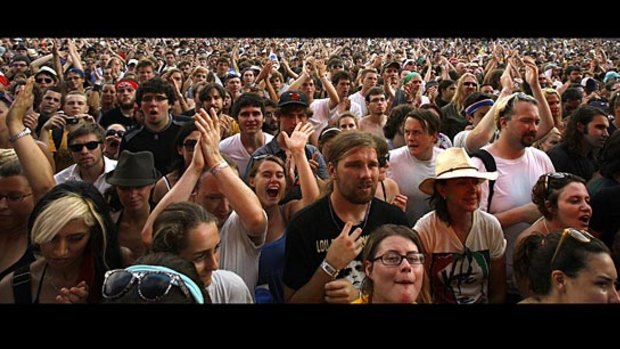 The crowd cheers on Lou Reed during the Lollapalooza music festival in 2017.