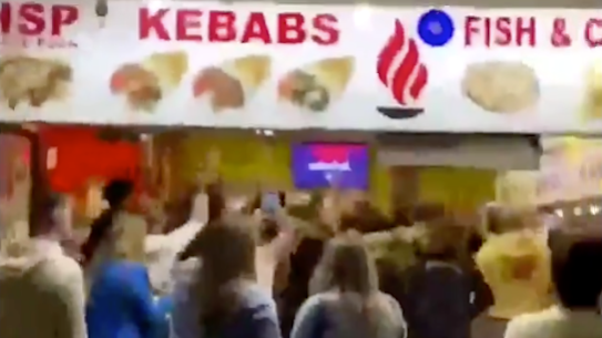 Video of the incident posted online shows a large group of revellers dancing inside a kebab shop in Fortitude Valley's popular Brunswick Street Mall.