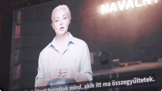 Yulia Navalny addresses a rally in Hungary via video.