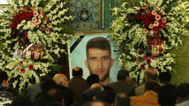 Relatives of Reza Barati, who was killed during a riot on Manus, mourn his death in Tehran in February 2014.