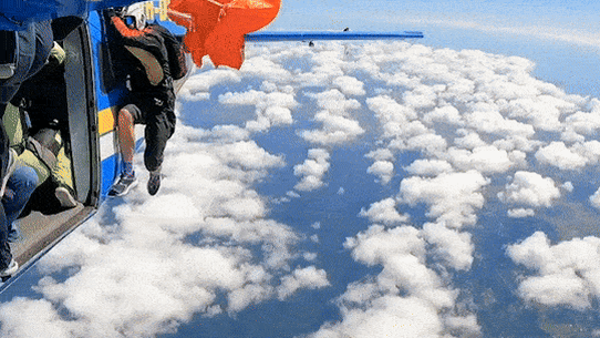 Skydiver caught on the tail.