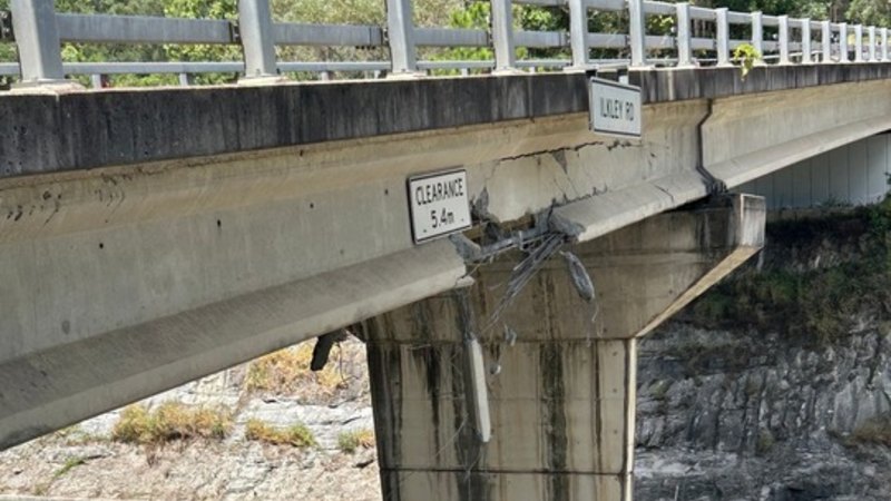 Bruce Highway closes after truck hits bridge