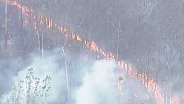 Fire has been crawling across the landscape around Pechey, north of Toowoomba, over the weekend.