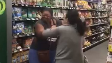 A leading anti-terrorism expert warns that extremist groups are looking to exploit footage such as these two women allegedly fighting over toilet paper at the Woolworths in Chullora.