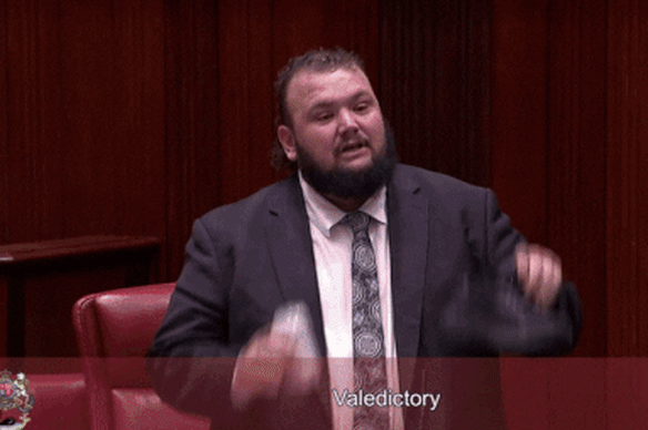 WA upper house MP Kyle McGinn does a “shoey” at the end of his final speech to parliament.