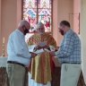 A bishop blesses the civil union of Fr John Davis and Fr Rob Whalley