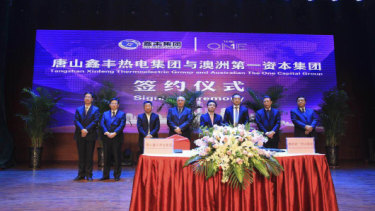 Tangshan signing ceremony. Cr Vince Badalati standing onstage at the signing ceremony between Xinfeng and One Capital in Tangshan, China, in April 2016. 