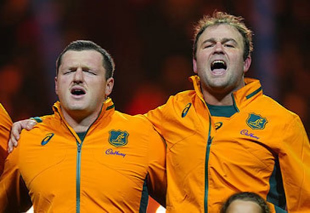 Matt Faessler and Harry Wilson sing national anthem at France v Australia Test match in Paris in 2025 (Franco Arland/Getty)