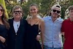 Brooklyn Beckham shared a photo from his time in Europe with wife Nicola Peltz along with his godfather Sir Elton John and his family. 