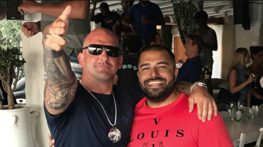 Ali Bazzi (right) with Comanchero boss Mark Buddle in the Mediterranean. Buddle tasked Bazzi with taking charge of the gang in Australia.
