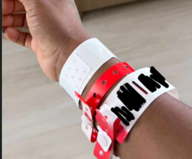 Simone Biles shows her hospital wristbands