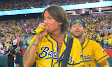 Urban surprised thousands of baseball fans with a song during the sixth inning. 