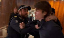 Lennon shouted, “this country is for Australians” before being dragged away from the hotel balcony by police.