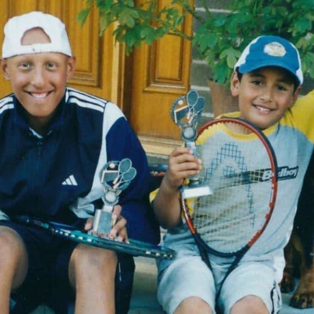 Christos and Nick Kyrgios outside their family home in Canberra as kids.