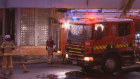 Firefighters at the scene of the fire at dawn on Friday.