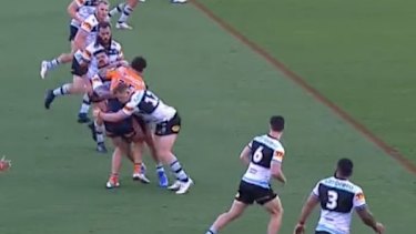 Andrew Fifita makes a tackle on Newcastleâ€™s David Klemmer, which is believed to be the incident that caused the injury.