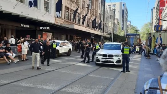 Police say a pedestrian was hit on Exhibition Street as officers pursued an allegedly stolen car. Four boys have been arrested.