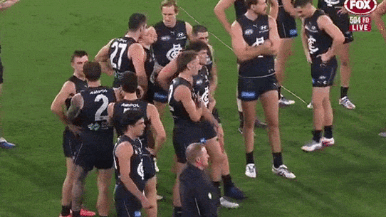 Elijah Hollands’ interaction with Blues coach Michael Voss after the final siren against Collingwood.