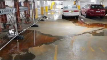 Water continues to seep into the building's car park.