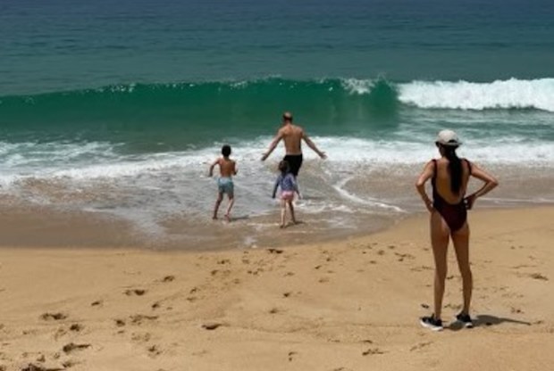 Meghan Duchess of Sussex Prince Harry Archie Lilibet at a beach during the summer holidays.