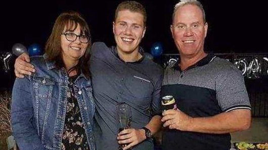 Senior Constable David Masters with wife Sharon and son Jack.