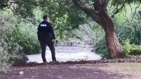 Police at the scene after the toddler was found unresponsive in a pond at Footscray Park. 