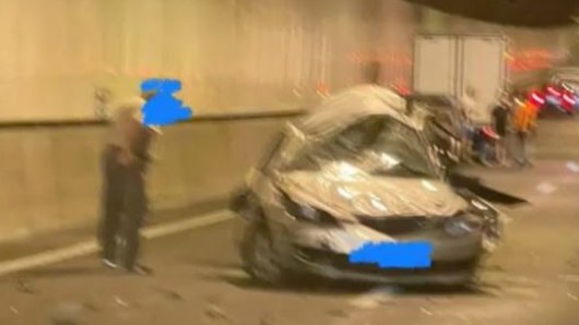 Former cop among dead in Brisbane tunnel smash