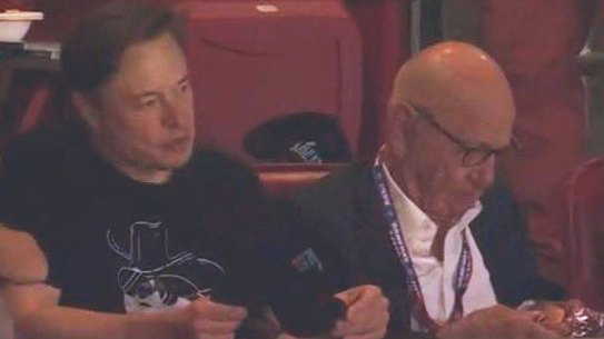 Elon Musk, centre, with Elisabeth and Rupert Murdoch at the Super Bowl.