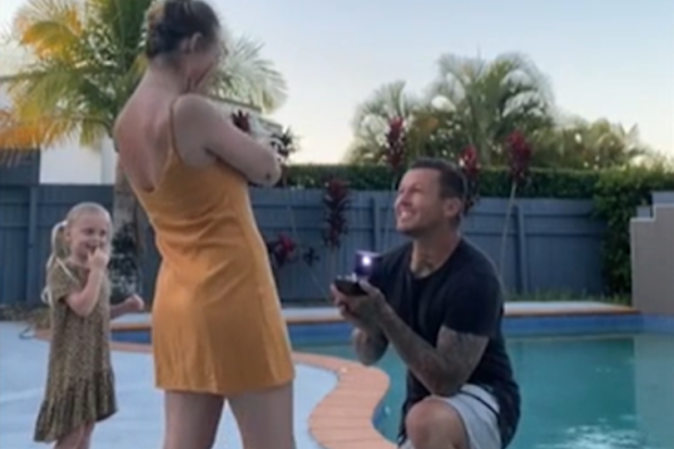 Todd Carney proposes to his girlfriend Susie Bradley.