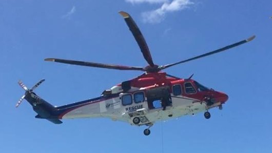 A Rescue 510 helicopter conducted sweeps of the area where the man disappeared in far north Queensland. 