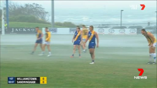 Wild weather during the Williamstown vs Sandringham match in Williamstown.