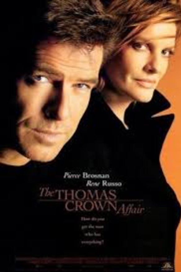 The promotional poster for The Thomas Crown Affair movie starring Pierce Brosnan and Rene Russo.