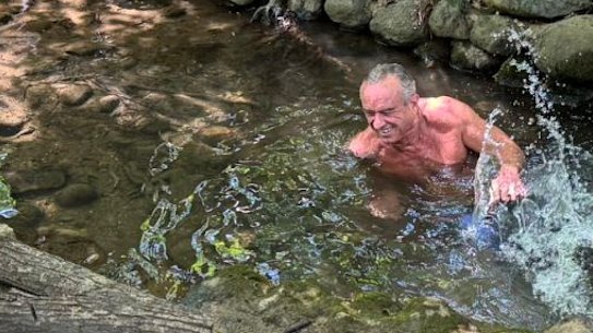 RFK Jr swims in Rock Creek, Dumbarton Oaks Park, during a Mother’s Day hike.