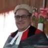 Kiribati High Court Justice David Lambourne, right, pictured in 2019 with Sir John Baptist Muri, a former chief justice of the High Court of Kiribati. The Kiribati government has been seeking to deport Lambourne.
