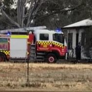 Man in custody after woman and child die in NSW house fire