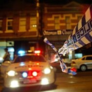 Sydney woman charged after 'throwing television' at police officer