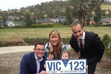 Then opposition Leader Daniel Andrews and future deputy premier James Merlino show off Labor’s new licence plate slogan before the 2014 election.