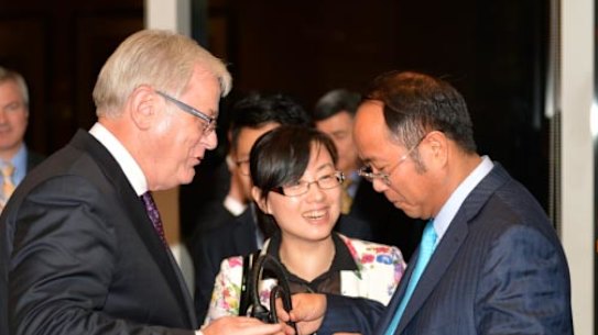 Huang with then Trade Minister Andrew Robb in Hong Kong in 2014, the year the China free trade agreement was signed.
